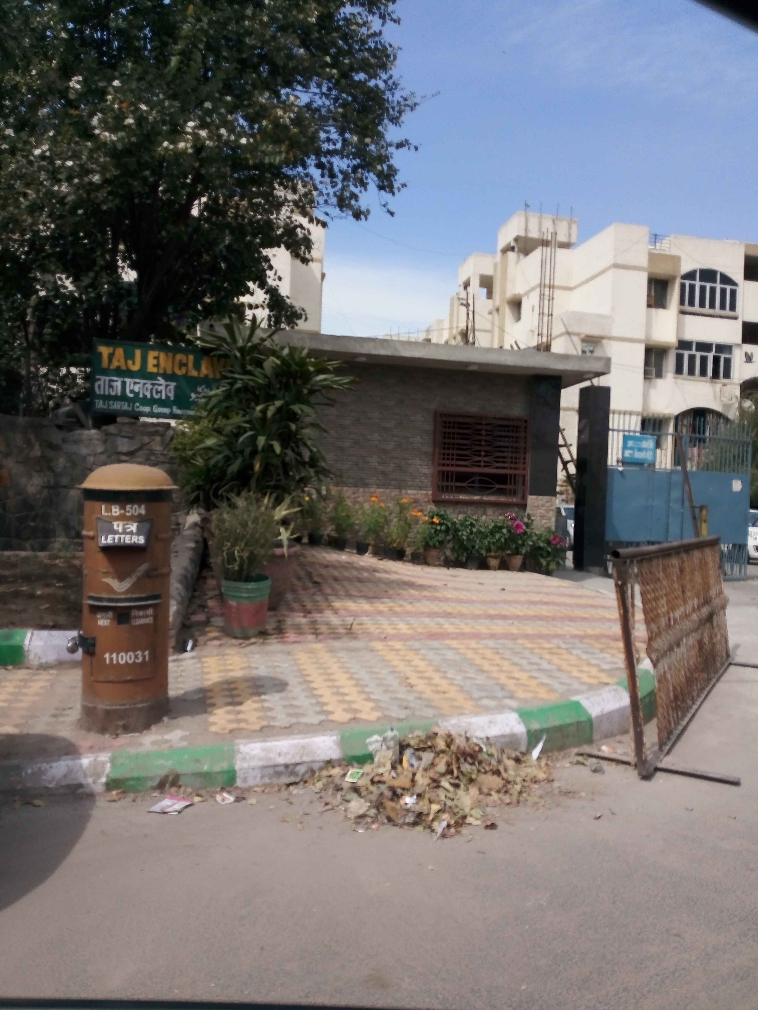 taj enclave apartment parking